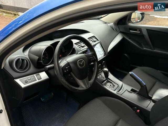 Білий Мазда 3, об'ємом двигуна 1.6 л та пробігом 151 тис. км за 6850 $, фото 9 на Automoto.ua