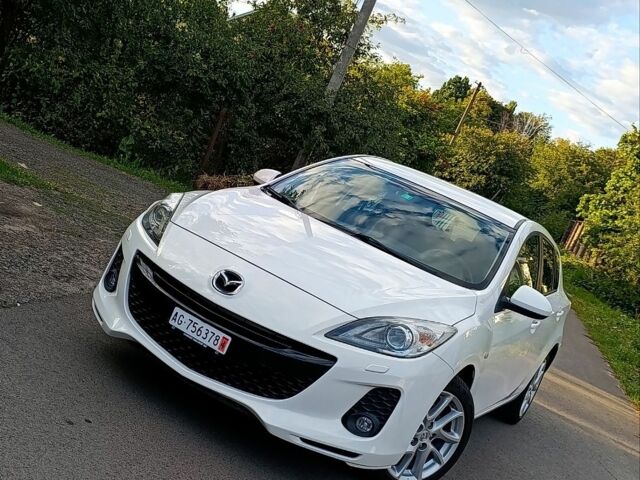 Белый Мазда 3, объемом двигателя 2 л и пробегом 200 тыс. км за 8500 $, фото 2 на Automoto.ua