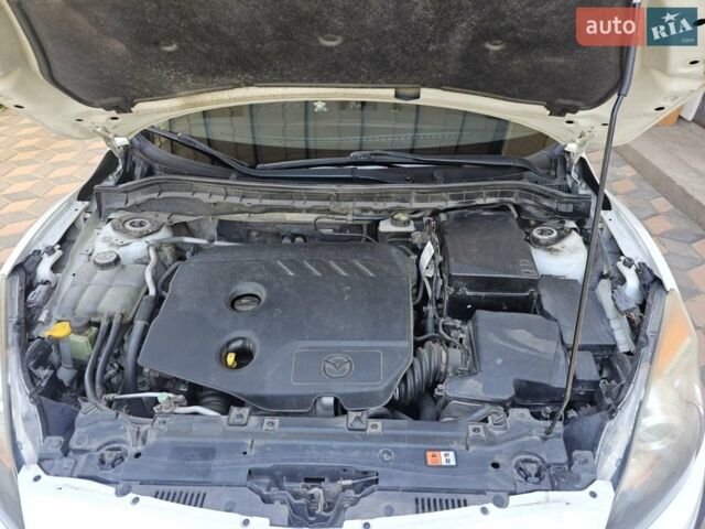 Білий Мазда 3, об'ємом двигуна 1.56 л та пробігом 230 тис. км за 6500 $, фото 4 на Automoto.ua