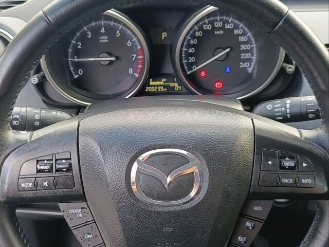 Белый Мазда 3, объемом двигателя 2 л и пробегом 200 тыс. км за 8500 $, фото 57 на Automoto.ua