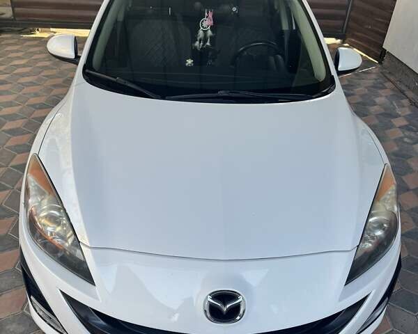Білий Мазда 3, об'ємом двигуна 1.56 л та пробігом 227 тис. км за 7900 $, фото 3 на Automoto.ua