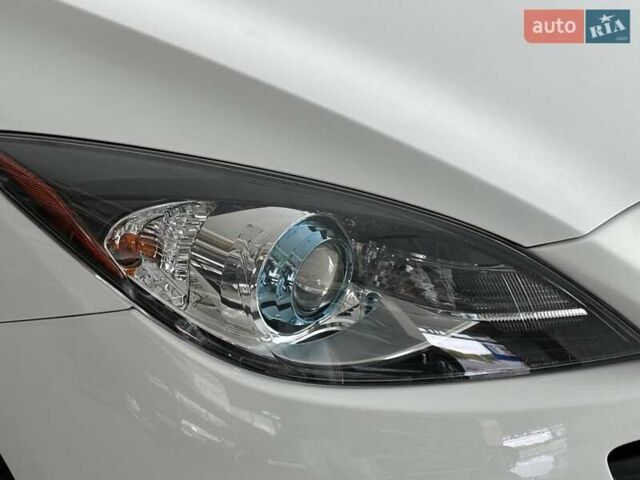 Белый Мазда 3, объемом двигателя 2 л и пробегом 85 тыс. км за 10490 $, фото 4 на Automoto.ua