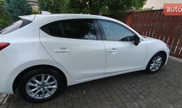 Белый Мазда 3, объемом двигателя 2 л и пробегом 169 тыс. км за 9400 $, фото 8 на Automoto.ua