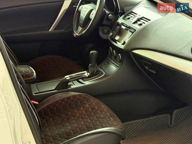 Белый Мазда 3, объемом двигателя 2 л и пробегом 85 тыс. км за 10490 $, фото 22 на Automoto.ua