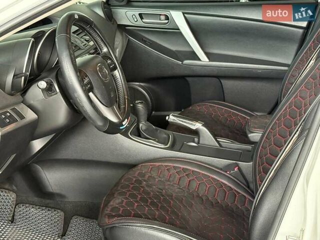 Белый Мазда 3, объемом двигателя 2 л и пробегом 85 тыс. км за 10490 $, фото 11 на Automoto.ua