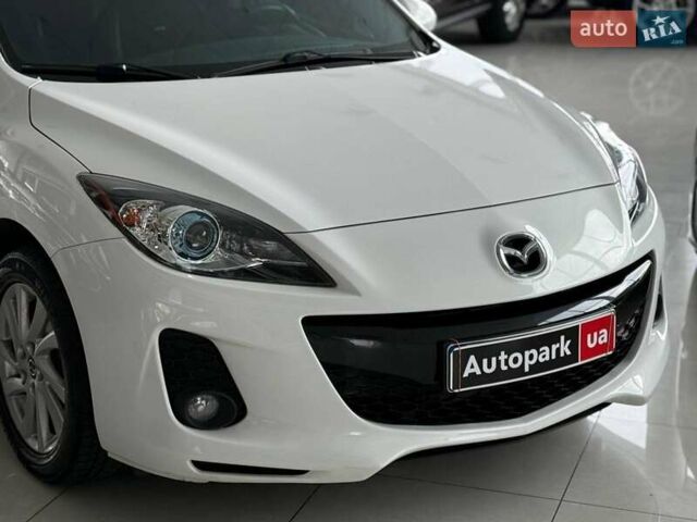 Белый Мазда 3, объемом двигателя 2 л и пробегом 85 тыс. км за 10490 $, фото 3 на Automoto.ua