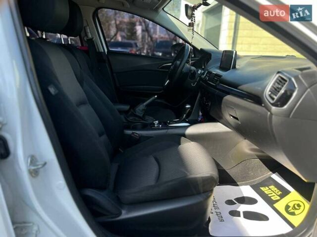 Белый Мазда 3, объемом двигателя 2 л и пробегом 178 тыс. км за 9300 $, фото 20 на Automoto.ua