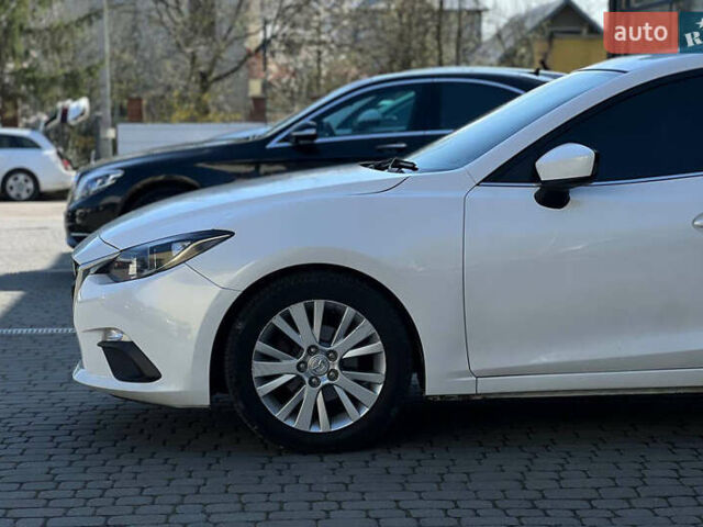 Белый Мазда 3, объемом двигателя 2 л и пробегом 178 тыс. км за 9300 $, фото 7 на Automoto.ua