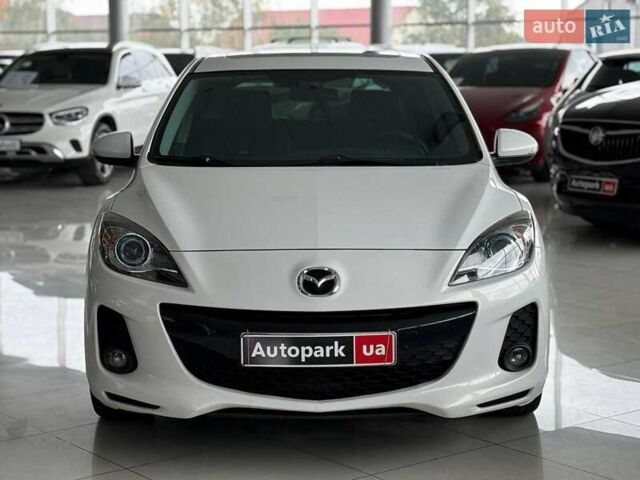 Белый Мазда 3, объемом двигателя 2 л и пробегом 85 тыс. км за 10490 $, фото 1 на Automoto.ua