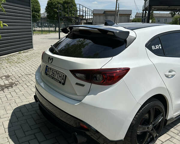 Белый Мазда 3, объемом двигателя 2 л и пробегом 291 тыс. км за 9999 $, фото 14 на Automoto.ua
