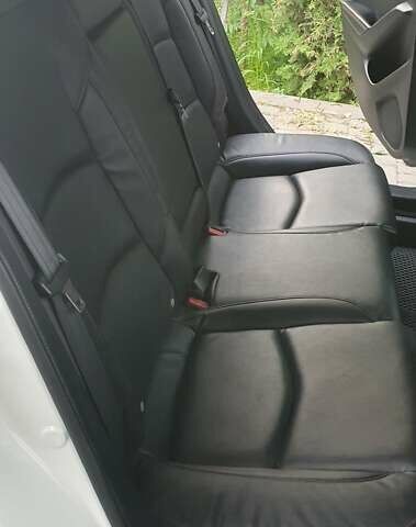 Белый Мазда 3, объемом двигателя 2 л и пробегом 169 тыс. км за 9400 $, фото 12 на Automoto.ua