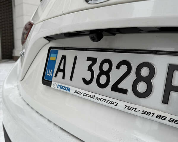 Белый Мазда 3, объемом двигателя 1.5 л и пробегом 150 тыс. км за 11000 $, фото 15 на Automoto.ua