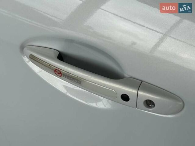 Белый Мазда 3, объемом двигателя 2 л и пробегом 85 тыс. км за 10490 $, фото 9 на Automoto.ua