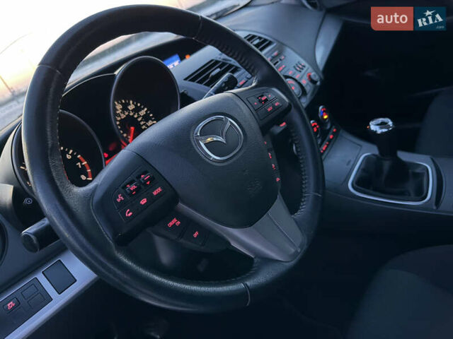 Белый Мазда 3, объемом двигателя 2 л и пробегом 199 тыс. км за 7850 $, фото 11 на Automoto.ua