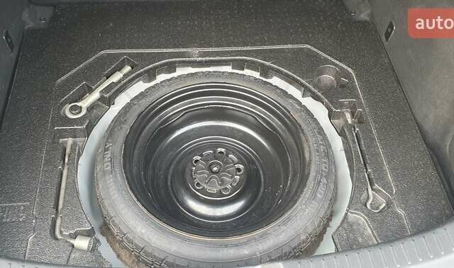 Белый Мазда 3, объемом двигателя 2 л и пробегом 169 тыс. км за 9400 $, фото 14 на Automoto.ua