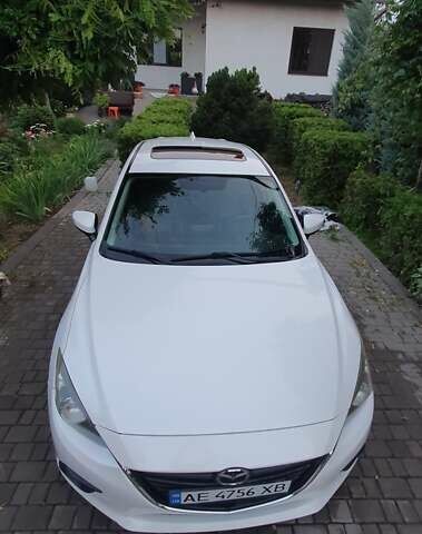 Белый Мазда 3, объемом двигателя 2 л и пробегом 169 тыс. км за 9400 $, фото 1 на Automoto.ua