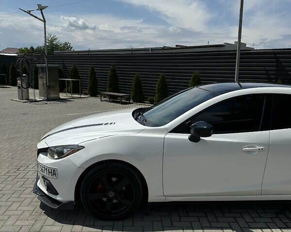 Белый Мазда 3, объемом двигателя 2 л и пробегом 291 тыс. км за 9999 $, фото 13 на Automoto.ua
