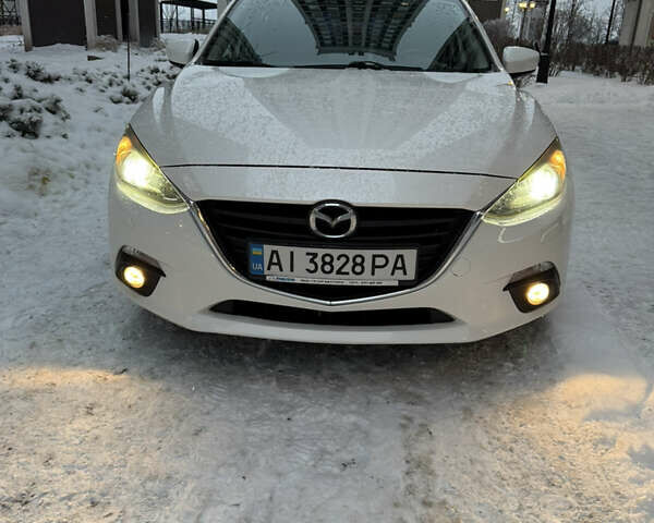 Белый Мазда 3, объемом двигателя 1.5 л и пробегом 150 тыс. км за 11000 $, фото 12 на Automoto.ua