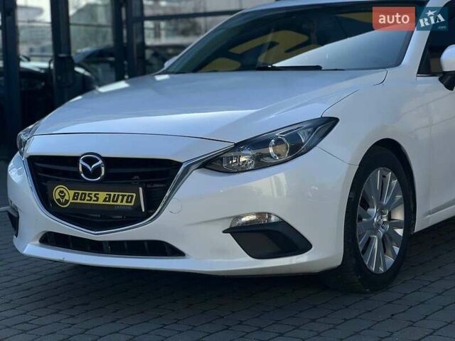 Белый Мазда 3, объемом двигателя 2 л и пробегом 178 тыс. км за 9300 $, фото 6 на Automoto.ua