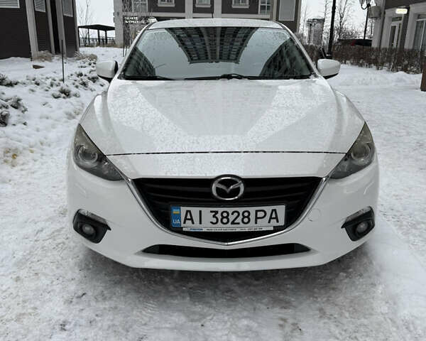 Белый Мазда 3, объемом двигателя 1.5 л и пробегом 150 тыс. км за 11000 $, фото 1 на Automoto.ua