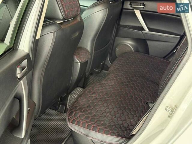 Белый Мазда 3, объемом двигателя 2 л и пробегом 85 тыс. км за 10490 $, фото 18 на Automoto.ua