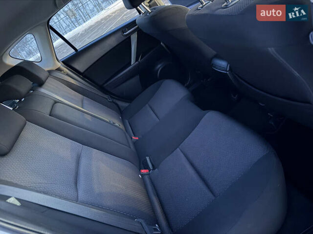 Белый Мазда 3, объемом двигателя 2 л и пробегом 199 тыс. км за 7850 $, фото 13 на Automoto.ua