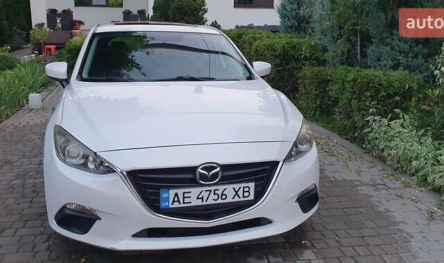 Белый Мазда 3, объемом двигателя 2 л и пробегом 169 тыс. км за 9400 $, фото 2 на Automoto.ua