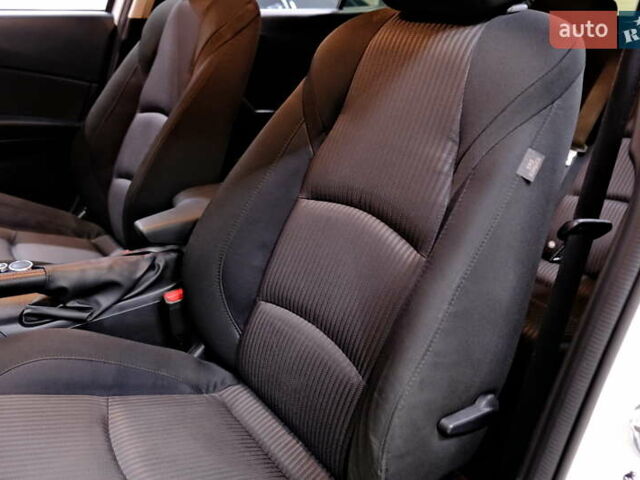 Білий Мазда 3, об'ємом двигуна 1.5 л та пробігом 93 тис. км за 13500 $, фото 29 на Automoto.ua