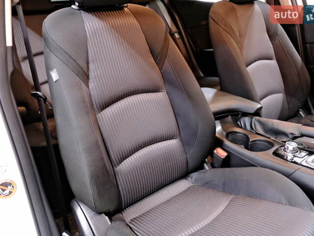 Білий Мазда 3, об'ємом двигуна 1.5 л та пробігом 93 тис. км за 13500 $, фото 41 на Automoto.ua