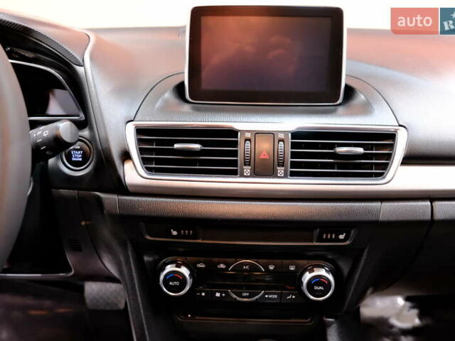 Білий Мазда 3, об'ємом двигуна 1.5 л та пробігом 93 тис. км за 13500 $, фото 17 на Automoto.ua