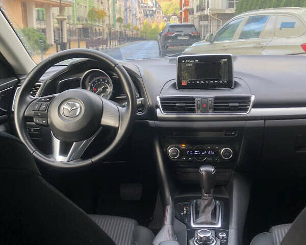 Білий Мазда 3, об'ємом двигуна 1.5 л та пробігом 148 тис. км за 12500 $, фото 10 на Automoto.ua