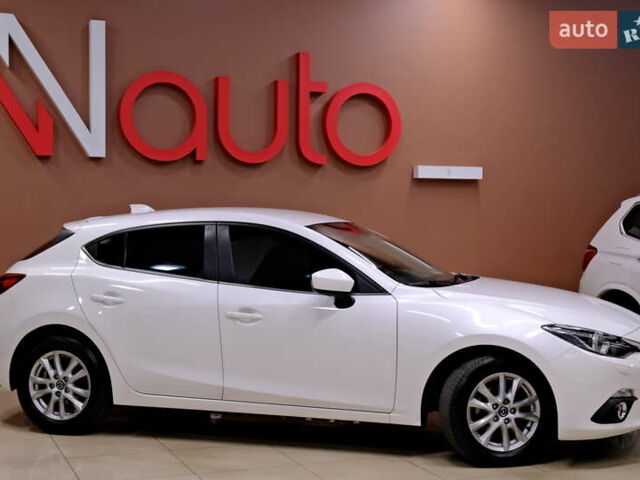 Білий Мазда 3, об'ємом двигуна 1.5 л та пробігом 93 тис. км за 13500 $, фото 7 на Automoto.ua