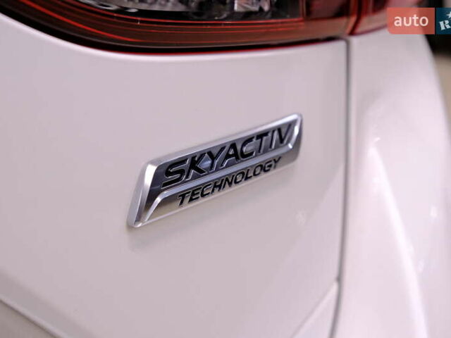 Білий Мазда 3, об'ємом двигуна 1.5 л та пробігом 93 тис. км за 13500 $, фото 45 на Automoto.ua