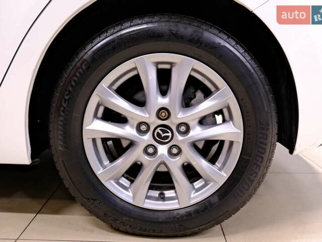Білий Мазда 3, об'ємом двигуна 1.5 л та пробігом 93 тис. км за 13500 $, фото 44 на Automoto.ua