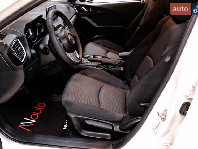 Білий Мазда 3, об'ємом двигуна 1.5 л та пробігом 93 тис. км за 13500 $, фото 27 на Automoto.ua