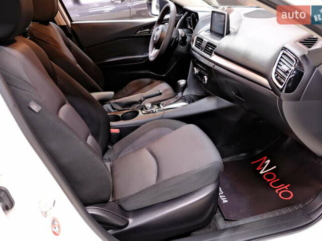 Білий Мазда 3, об'ємом двигуна 1.5 л та пробігом 93 тис. км за 13500 $, фото 39 на Automoto.ua