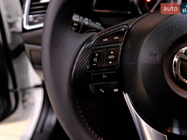 Білий Мазда 3, об'ємом двигуна 1.5 л та пробігом 93 тис. км за 13500 $, фото 20 на Automoto.ua