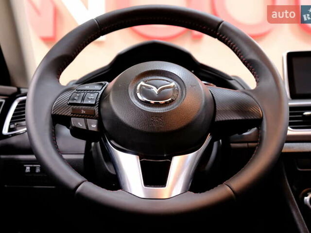 Білий Мазда 3, об'ємом двигуна 1.5 л та пробігом 93 тис. км за 13500 $, фото 43 на Automoto.ua