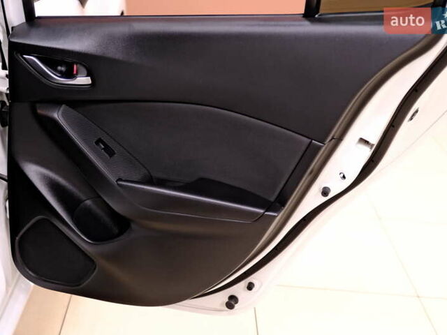 Білий Мазда 3, об'ємом двигуна 1.5 л та пробігом 93 тис. км за 13500 $, фото 34 на Automoto.ua