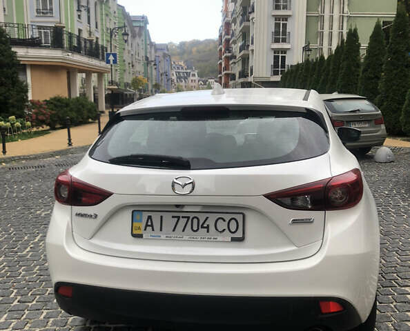 Білий Мазда 3, об'ємом двигуна 1.5 л та пробігом 148 тис. км за 12500 $, фото 4 на Automoto.ua