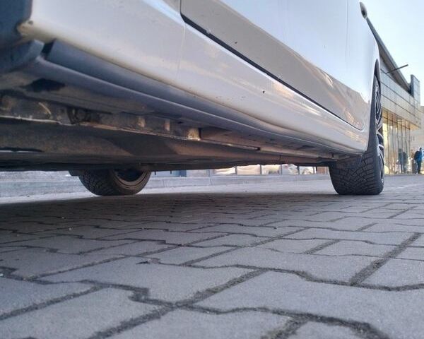 Белый Мазда 3, объемом двигателя 2.19 л и пробегом 256 тыс. км за 10850 $, фото 7 на Automoto.ua