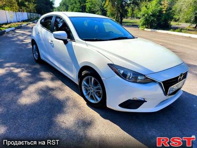 Белый Мазда 3, объемом двигателя 2 л и пробегом 141 тыс. км за 9600 $, фото 1 на Automoto.ua