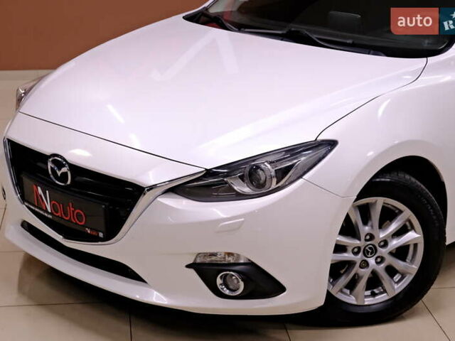 Білий Мазда 3, об'ємом двигуна 1.5 л та пробігом 93 тис. км за 13500 $, фото 10 на Automoto.ua