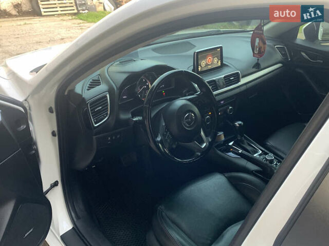Белый Мазда 3, объемом двигателя 2.19 л и пробегом 225 тыс. км за 14000 $, фото 7 на Automoto.ua