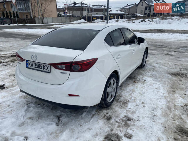 Белый Мазда 3, объемом двигателя 2 л и пробегом 180 тыс. км за 9500 $, фото 6 на Automoto.ua