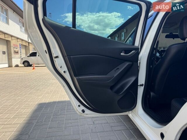 Білий Мазда 3, об'ємом двигуна 2 л та пробігом 150 тис. км за 10900 $, фото 20 на Automoto.ua