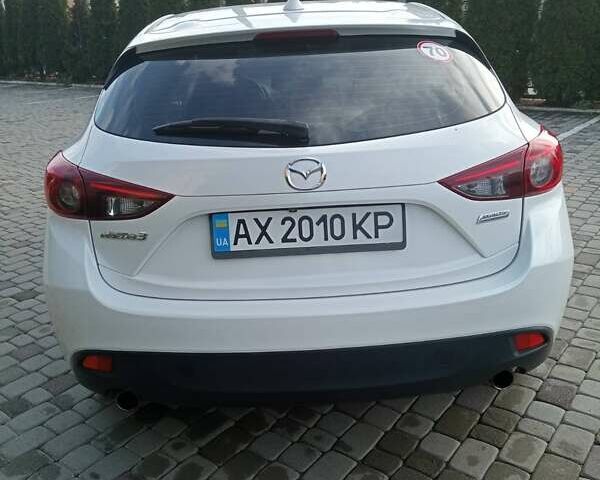 Белый Мазда 3, объемом двигателя 2 л и пробегом 140 тыс. км за 12500 $, фото 2 на Automoto.ua
