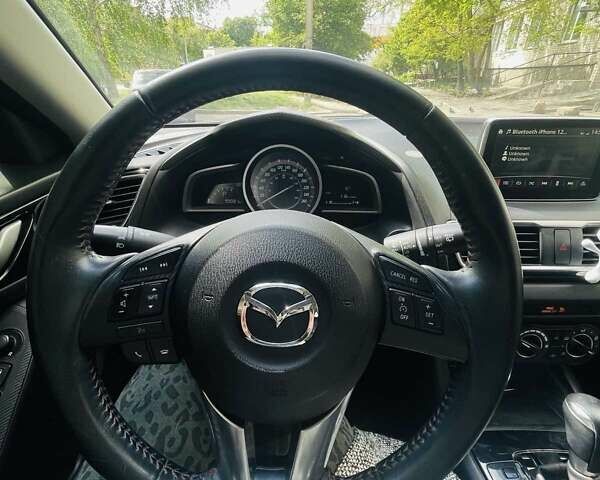 Белый Мазда 3, объемом двигателя 2 л и пробегом 99 тыс. км за 12000 $, фото 5 на Automoto.ua