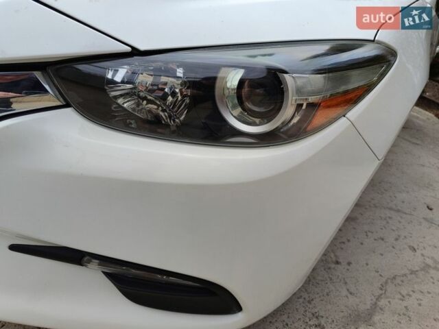 Білий Мазда 3, об'ємом двигуна 2.49 л та пробігом 105 тис. км за 13000 $, фото 7 на Automoto.ua