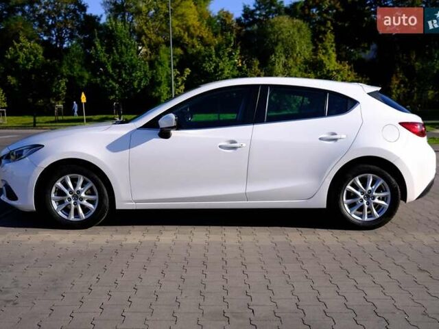 Білий Мазда 3, об'ємом двигуна 1.5 л та пробігом 74 тис. км за 14500 $, фото 2 на Automoto.ua